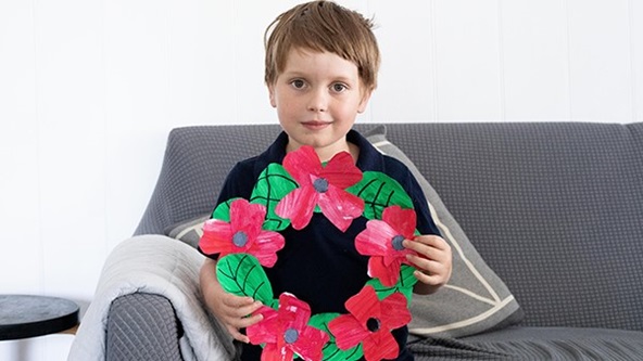 Child with Poppy Wreath